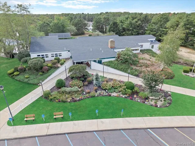 an aerial view of a house with a garden