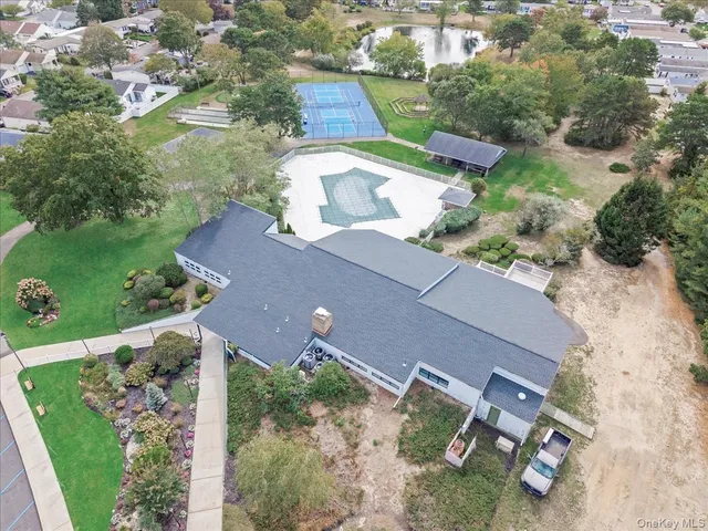 an aerial view of a house with a garden