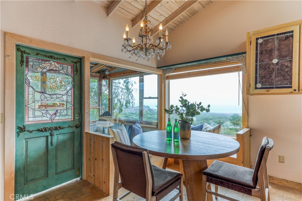 564 Croyden Lane Cambria, CA 93428 - Photo 12 of 64 a view of a dining room with furniture window and outside view