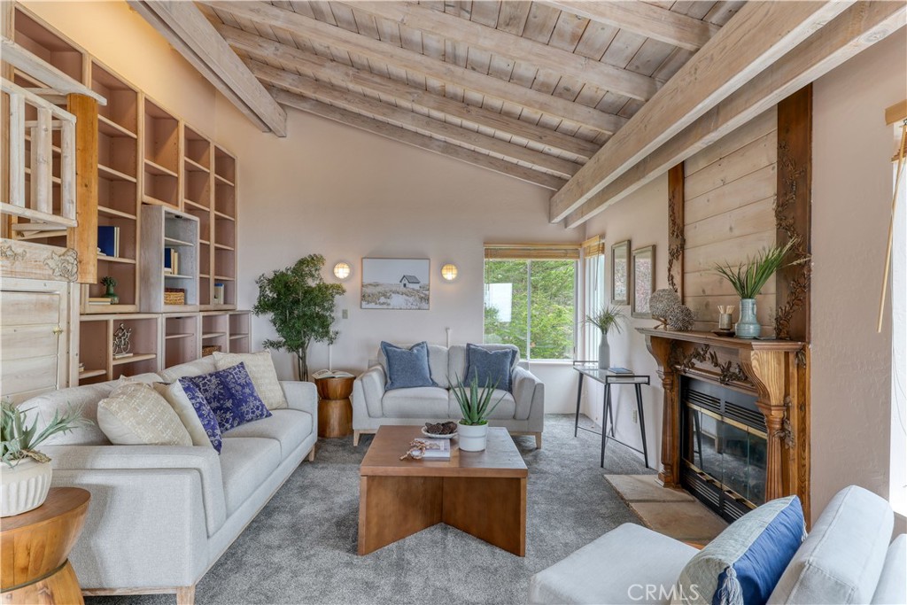 564 Croyden Lane Cambria, CA 93428 - Photo 18 of 64 a living room with furniture and a fireplace