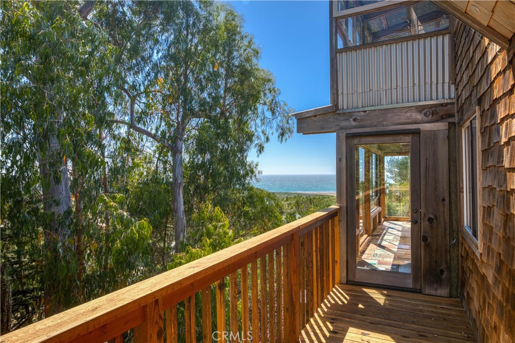 564 Croyden Lane Cambria, CA 93428 - Photo 32 of 64 deck extends to bedroom 2 and beyond