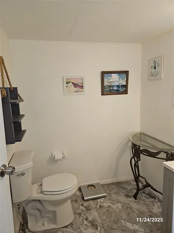 a bathroom with a toilet