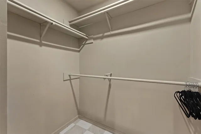 a bathroom with a shower and a toilet
