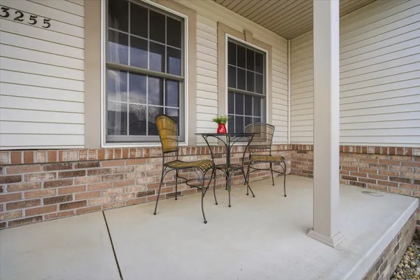 a view of house with patio