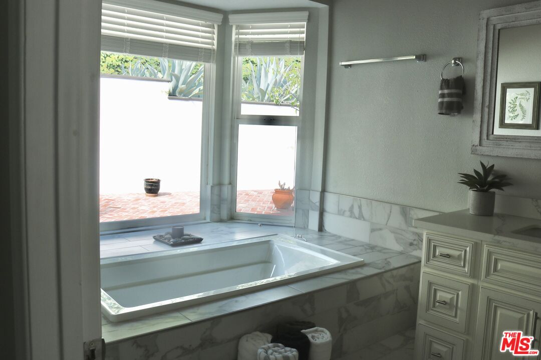 50 Rockinghorse Road Rancho Palos Verdes, CA 90275 - Photo 12 of 18 a bathroom with a shower and a sink
