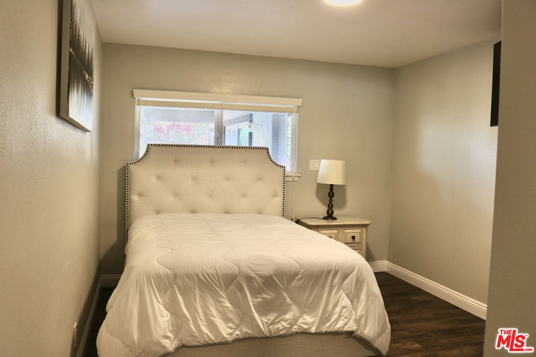 50 Rockinghorse Road Rancho Palos Verdes, CA 90275 - Photo 15 of 18 a bedroom with a bed and window