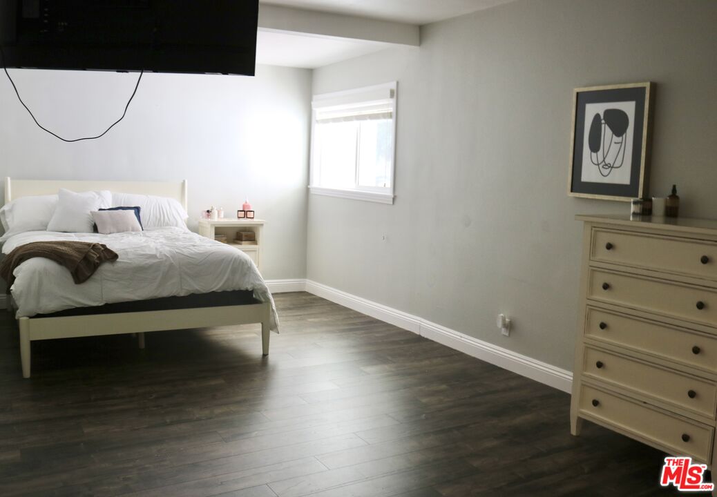 50 Rockinghorse Road Rancho Palos Verdes, CA 90275 - Photo 16 of 18 a bedroom with a bed and a mirror