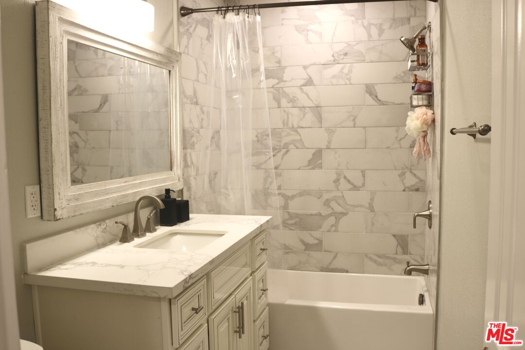 50 Rockinghorse Road Rancho Palos Verdes, CA 90275 - Photo 17 of 18 a bathroom with a sink and a mirror