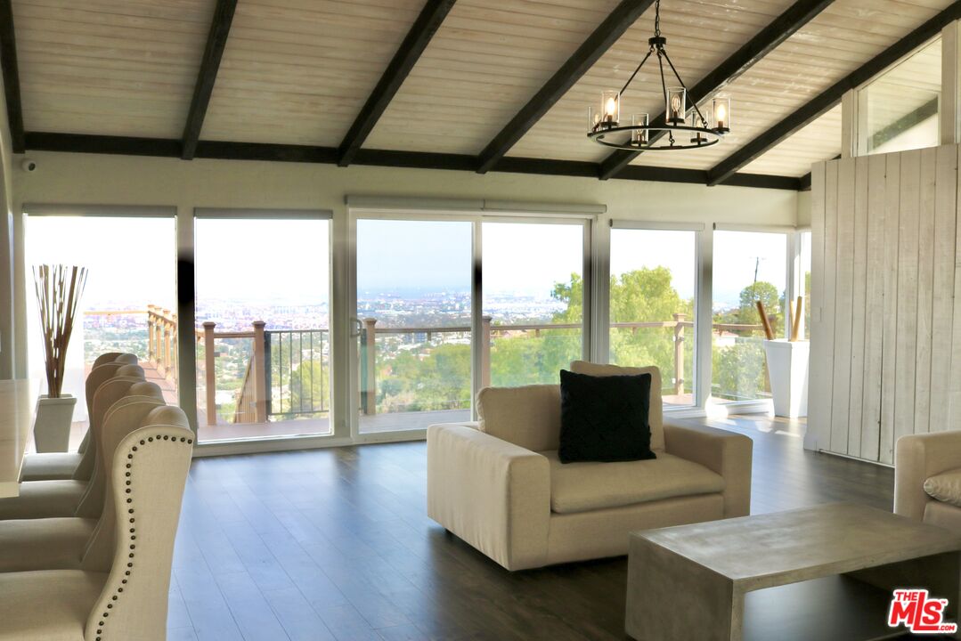 50 Rockinghorse Road Rancho Palos Verdes, CA 90275 - Photo 3 of 18 a living room with furniture and floor to ceiling windows