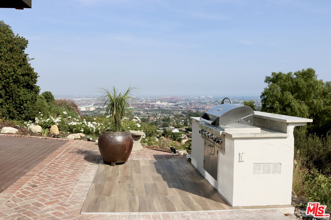 50 Rockinghorse Road Rancho Palos Verdes, CA 90275 - Photo 7 of 18 a view of a terrace with furniture and city view