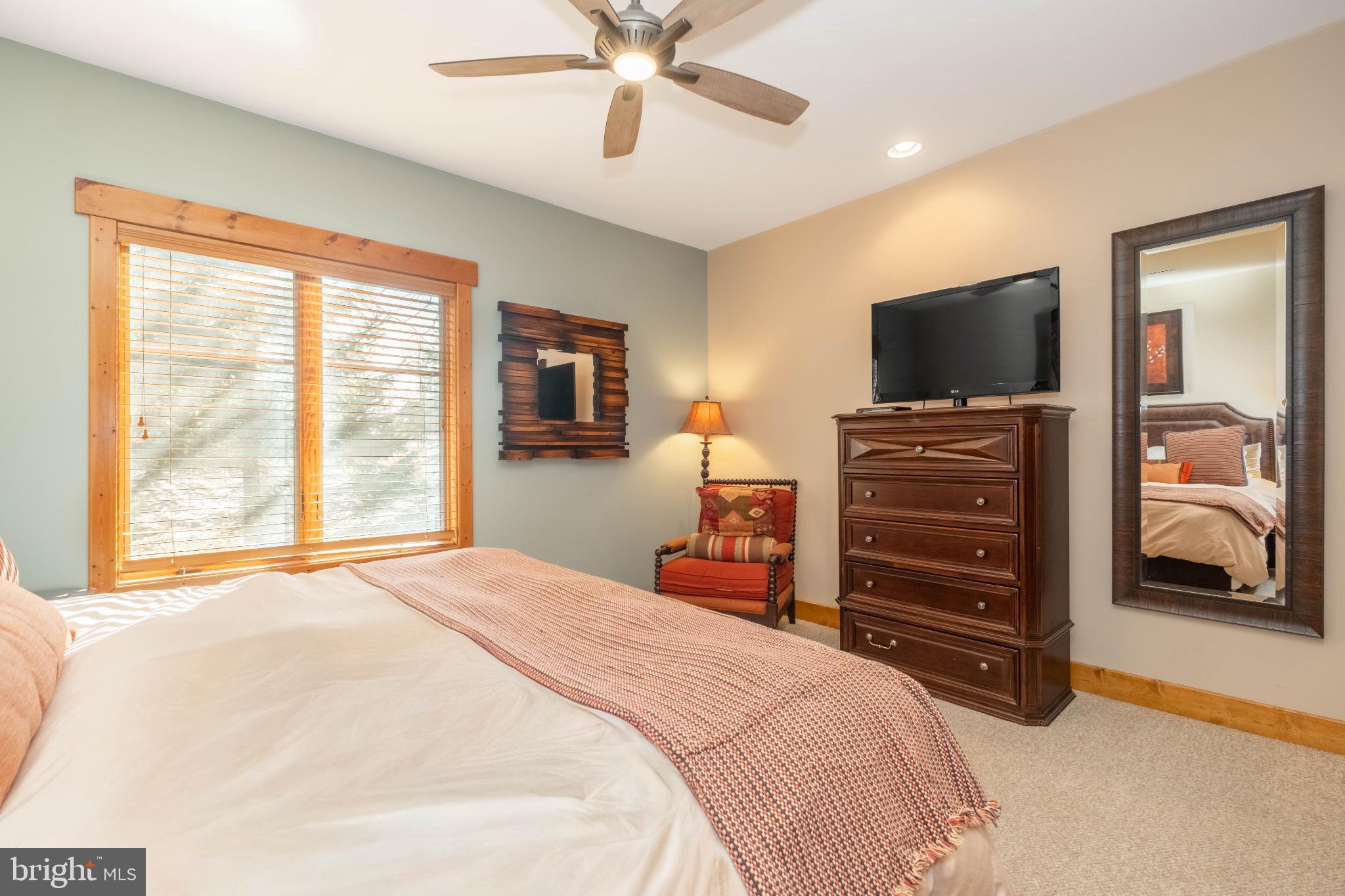 14 Ridge Run Road McHenry, MD 21541 - Photo 22 of 65 a bedroom with a bed and flat screen tv