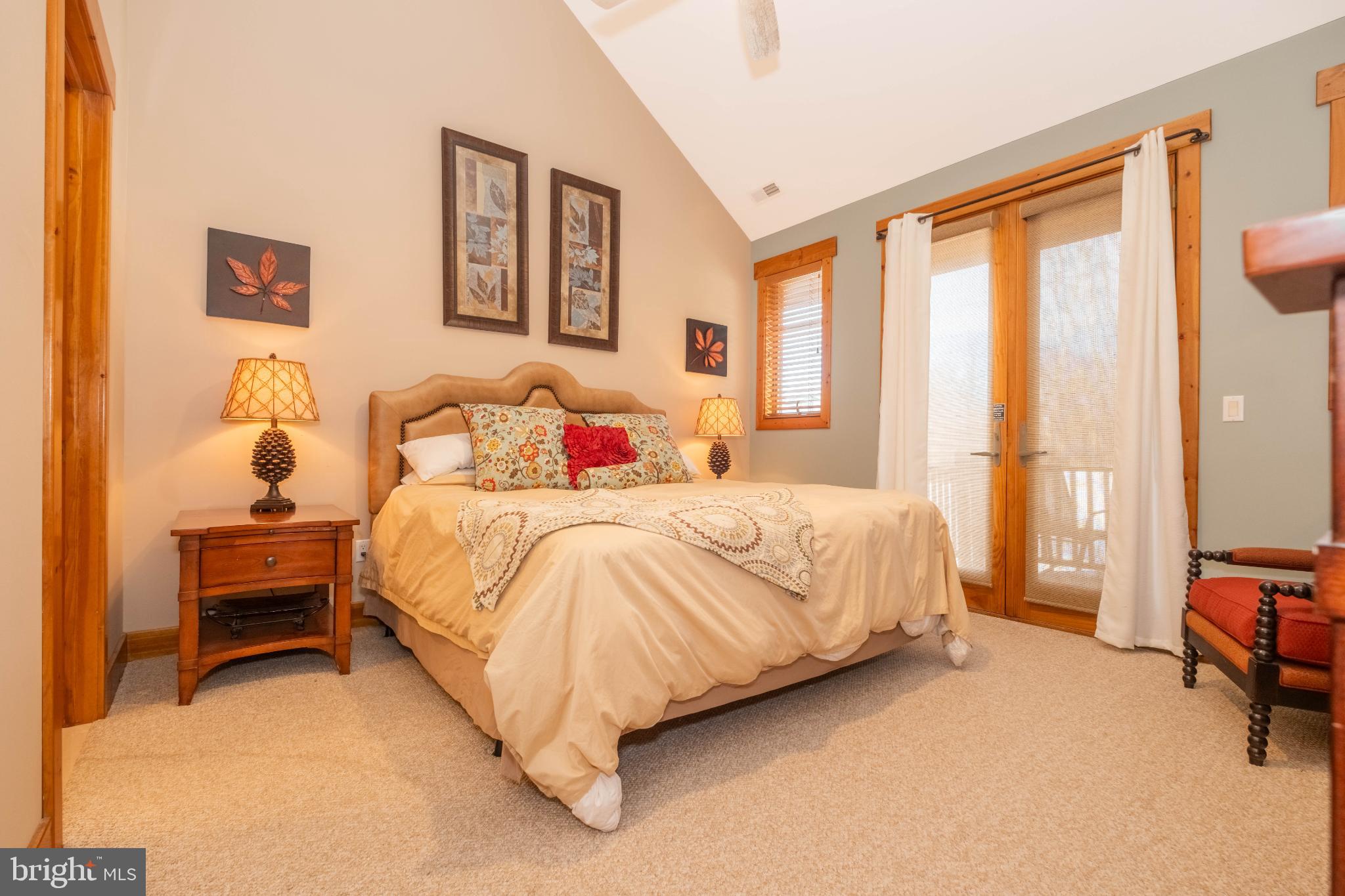 14 Ridge Run Road McHenry, MD 21541 - Photo 28 of 65 a bedroom with a bed chair and a large window