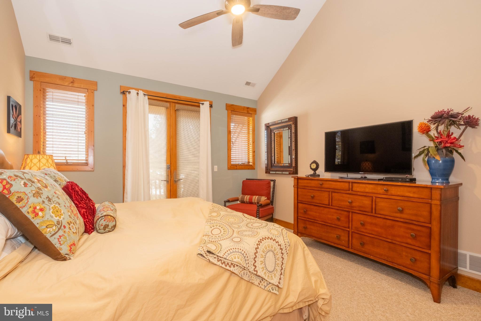 14 Ridge Run Road McHenry, MD 21541 - Photo 29 of 65 a bedroom with a bed and flat screen tv