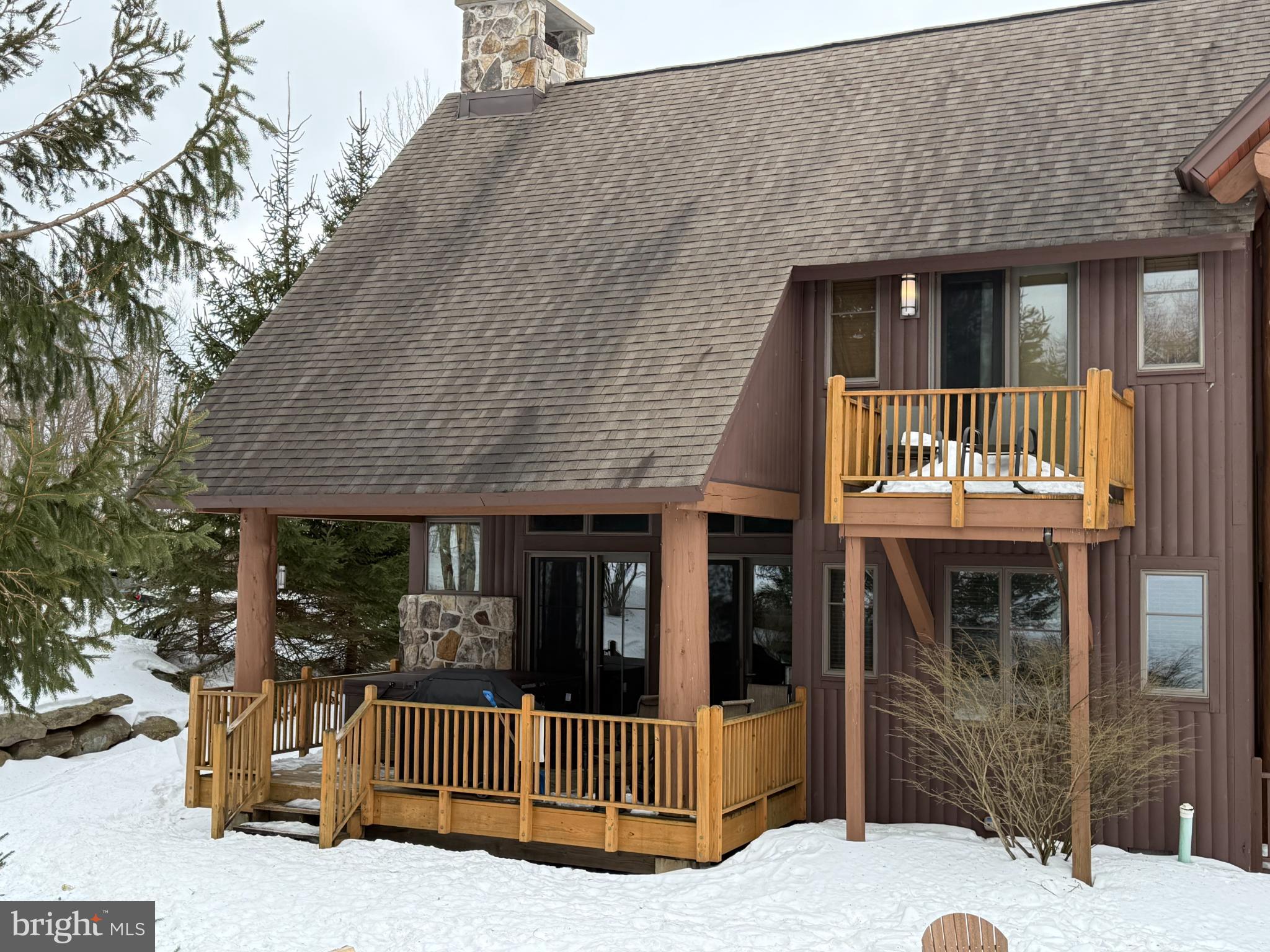 14 North Ridge Road, Unit 18 McHenry, MD 21541 - Photo 5 of 8 Charming chalet nestled in snowy landscape.