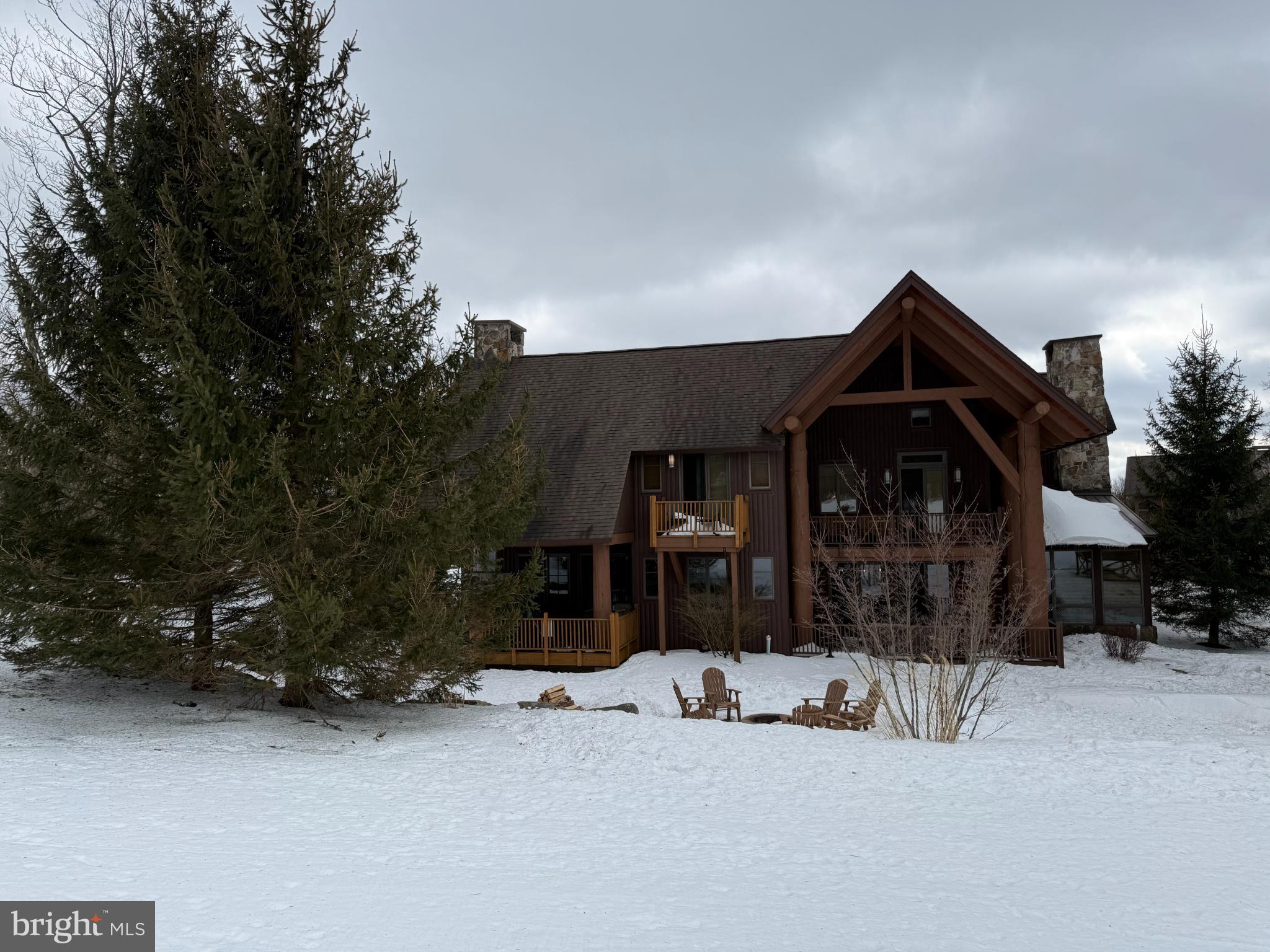 14 North Ridge Road, Unit 18 McHenry, MD 21541 - Photo 6 of 8 Charming chalet nestled in winter's embrace.