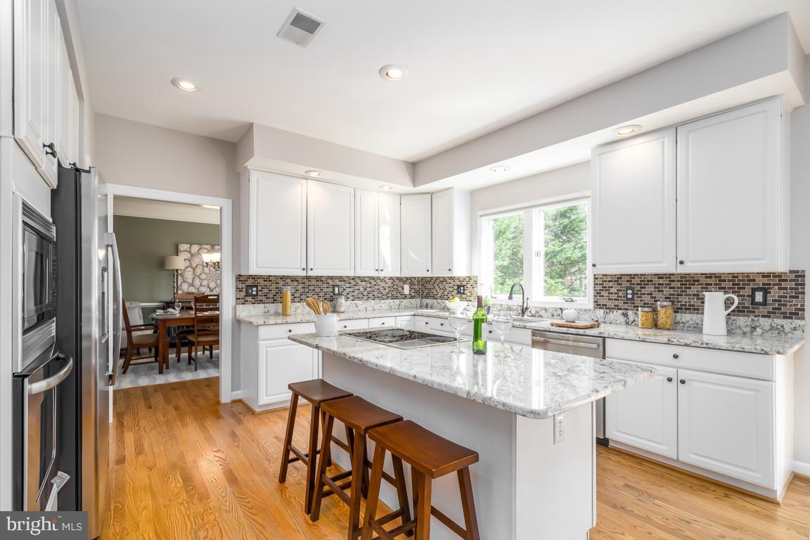 12907 Hedgetop Drive Herndon, VA 20171 - Photo 14 of 60 Crisp, white cabinets
