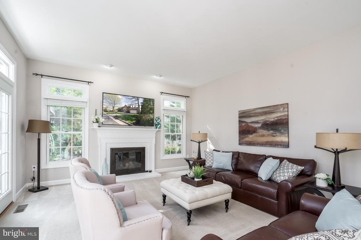 12907 Hedgetop Drive Herndon, VA 20171 - Photo 22 of 60 Gas fireplace and mantel; TV conveys