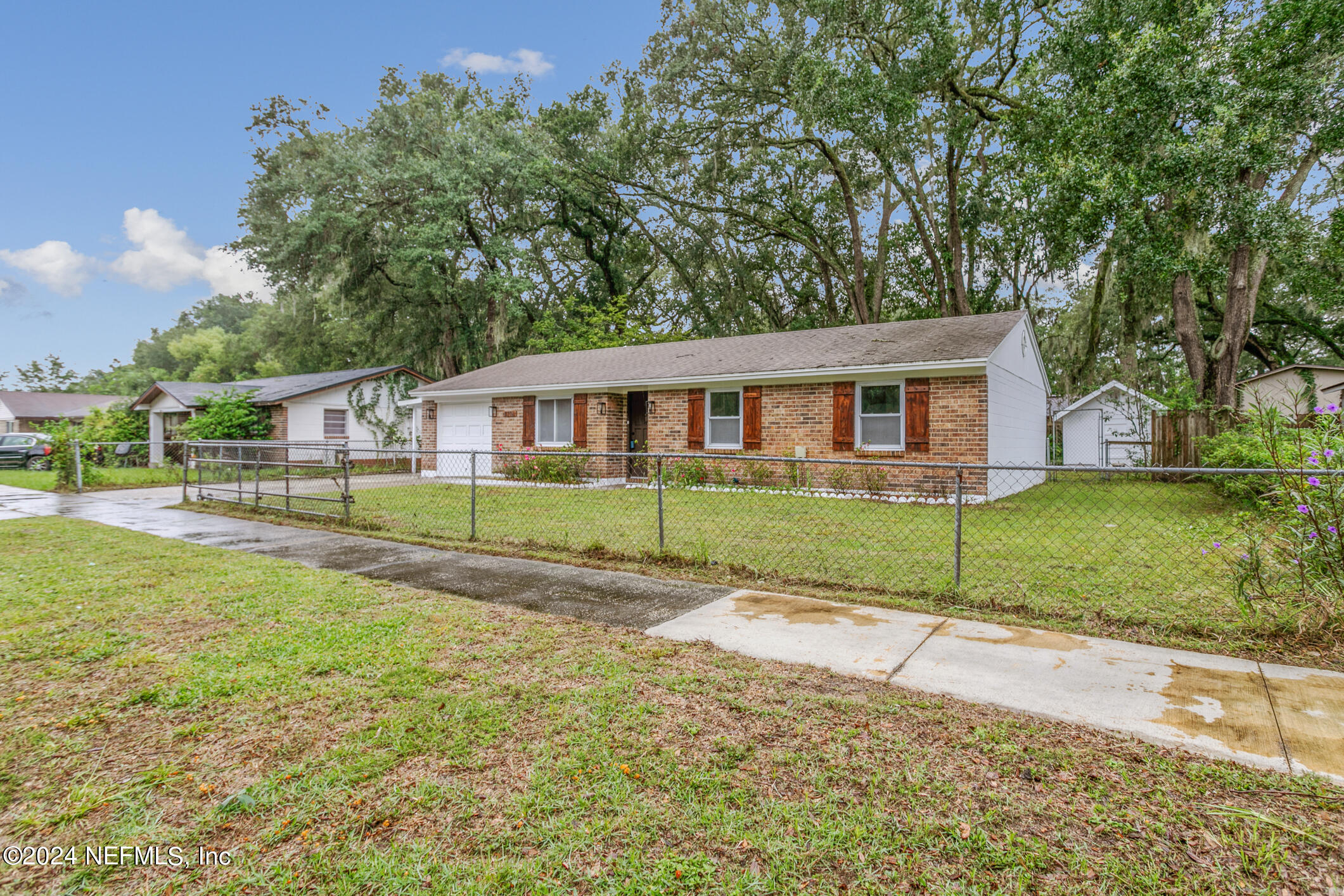 4216 Oriely Drive Jacksonville, FL 32210 - Photo 11 of 36 a view of house with a garden