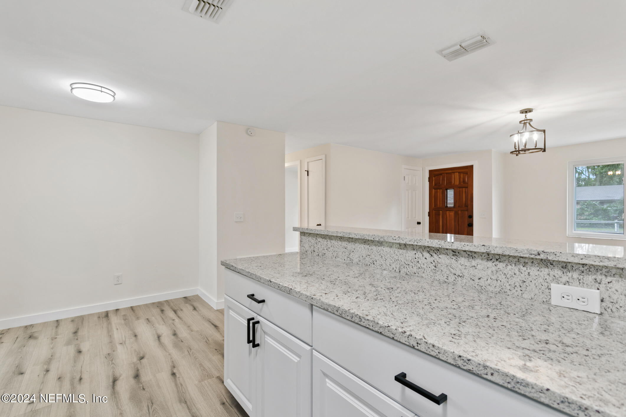 4216 Oriely Drive Jacksonville, FL 32210 - Photo 20 of 36 a bathroom with a sink and a mirror