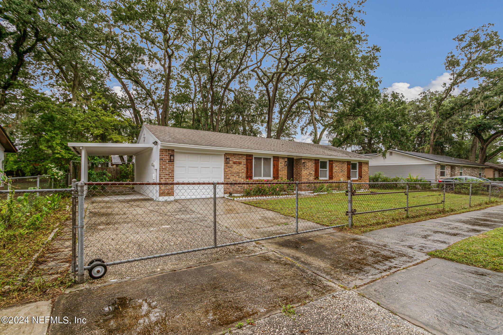 4216 Oriely Drive Jacksonville, FL 32210 - Photo 6 of 36 a view of house with a backyard