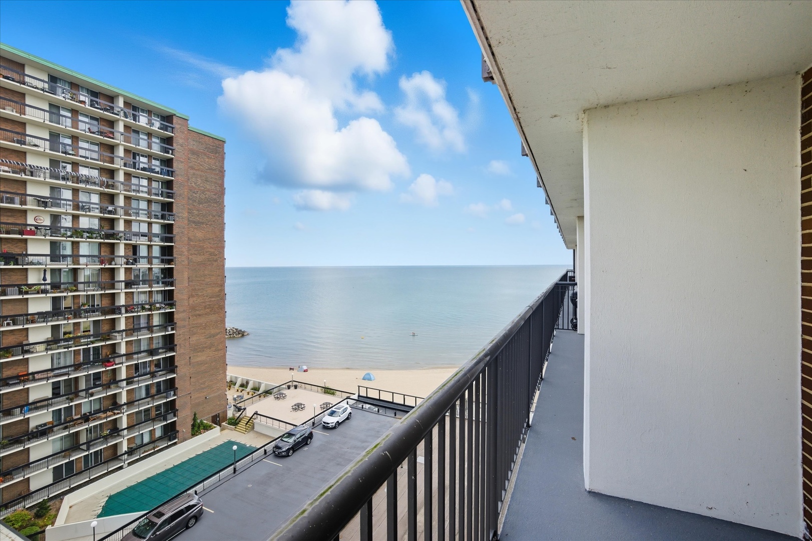 5855 North Sheridan Road, Unit 9F Chicago, IL 60660 - Photo 11 of 23 a view of balcony with wooden floor