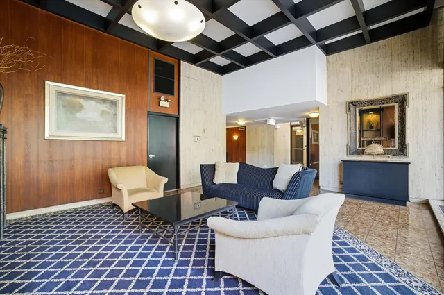 a view of a living room and dining room