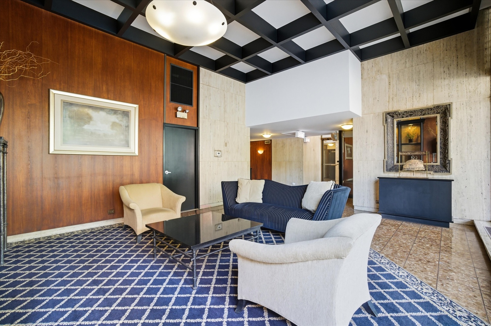 5855 North Sheridan Road, Unit 9F Chicago, IL 60660 - Photo 15 of 23 a living room with furniture and a rug