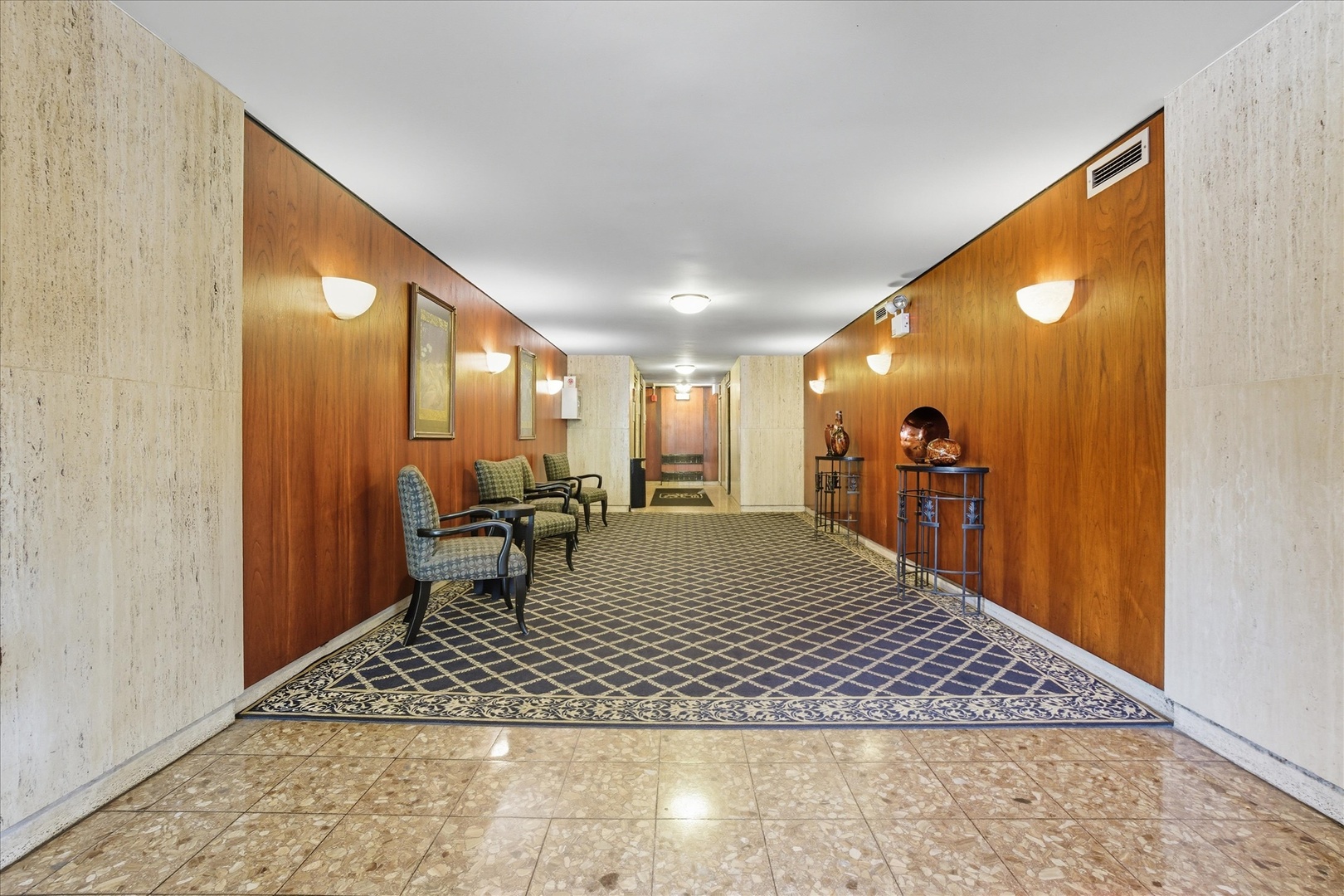 5855 North Sheridan Road, Unit 9F Chicago, IL 60660 - Photo 16 of 23 a view of a living room and dining room