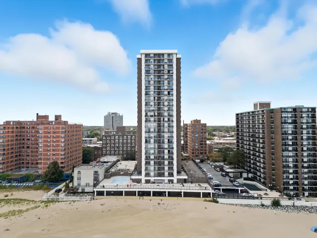 a view of a city with tall buildings