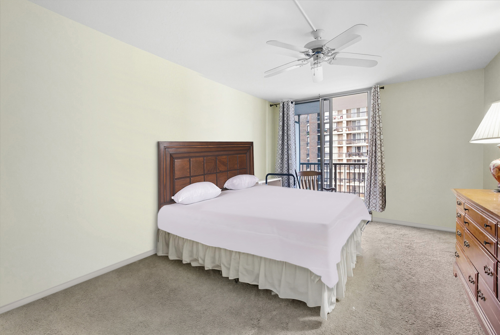5855 North Sheridan Road, Unit 9F Chicago, IL 60660 - Photo 8 of 23 a bedroom with a bed and window