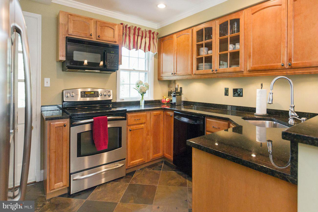 608 Carysbrook Road Baltimore, MD 21208 - Photo 3 of 30 Updated w/ granite counters & slate flooring