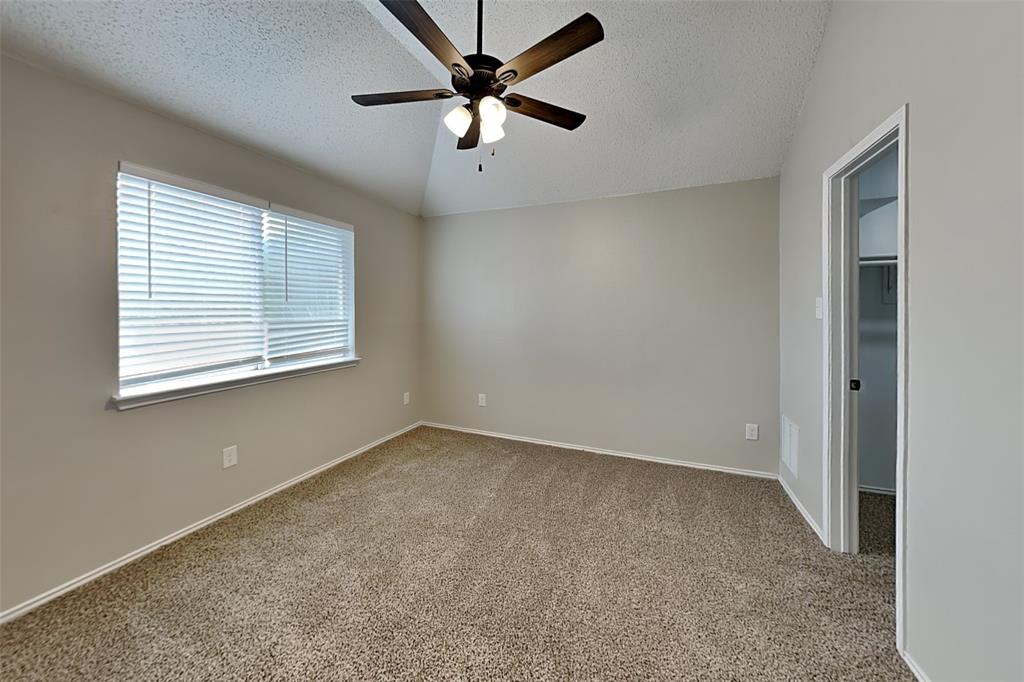 2224 Red Maple Road Flower Mound, TX 75022 - Photo 15 of 22 a view of an empty room with a window