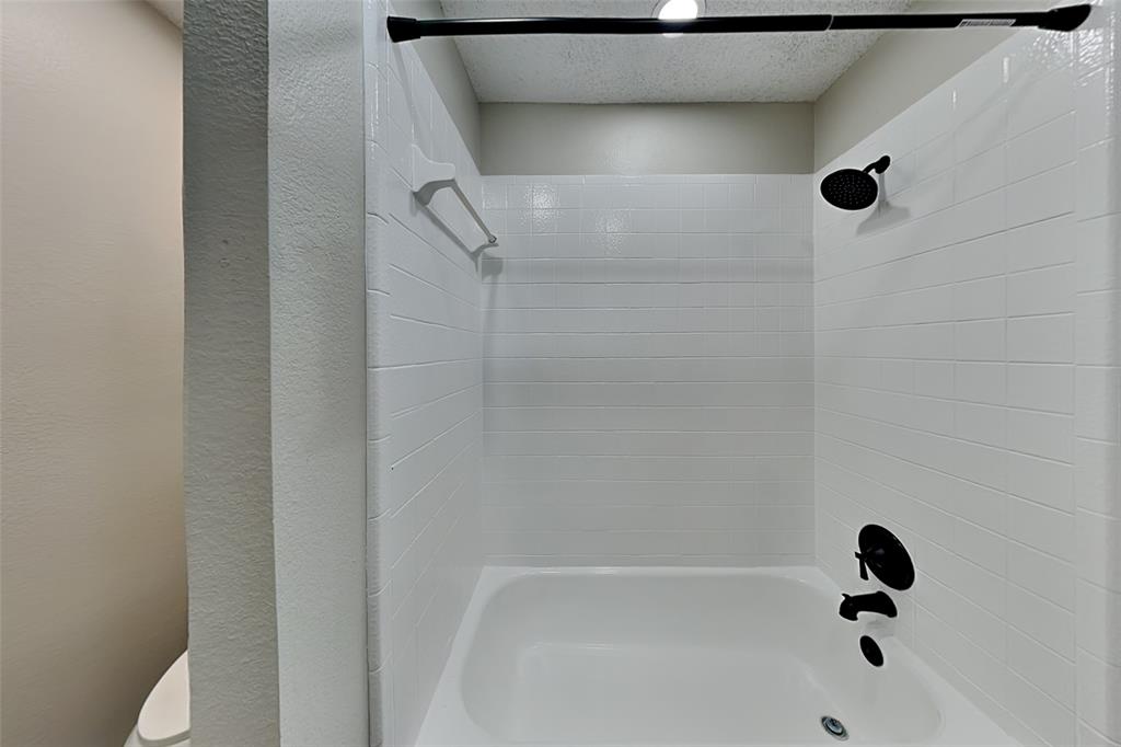 2224 Red Maple Road Flower Mound, TX 75022 - Photo 18 of 22 a bathroom with a tub