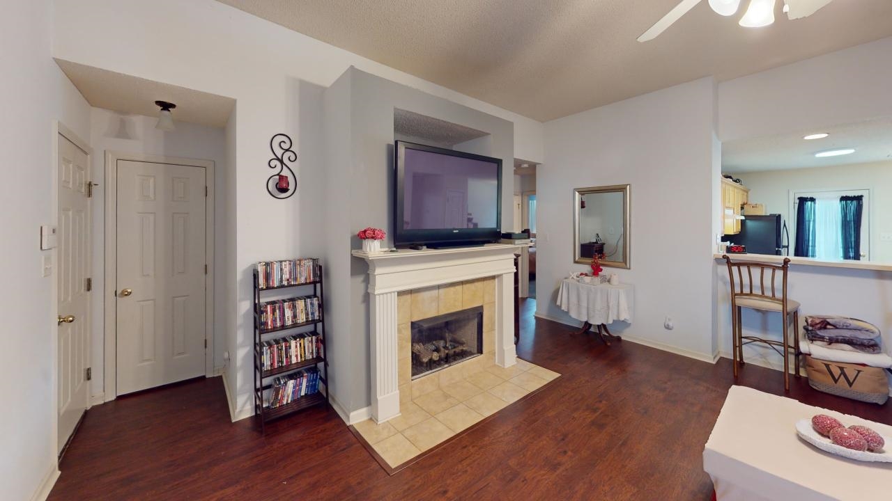 6916 Manslick Road Cordova, TN 38018 - Photo 3 of 17 a view of a livingroom with furniture and a fireplace