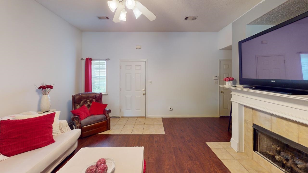 6916 Manslick Road Cordova, TN 38018 - Photo 4 of 17 a living room with furniture and a fireplace