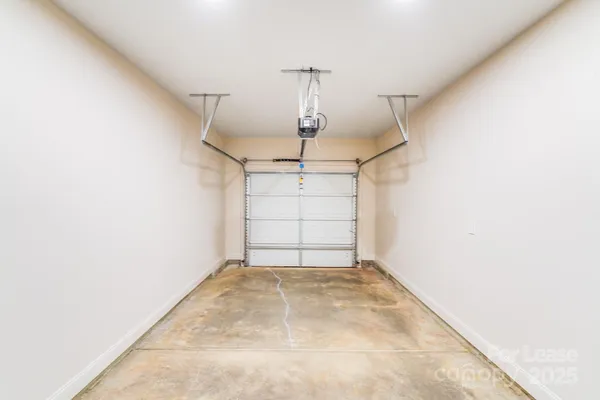 a view of a backyard with fence