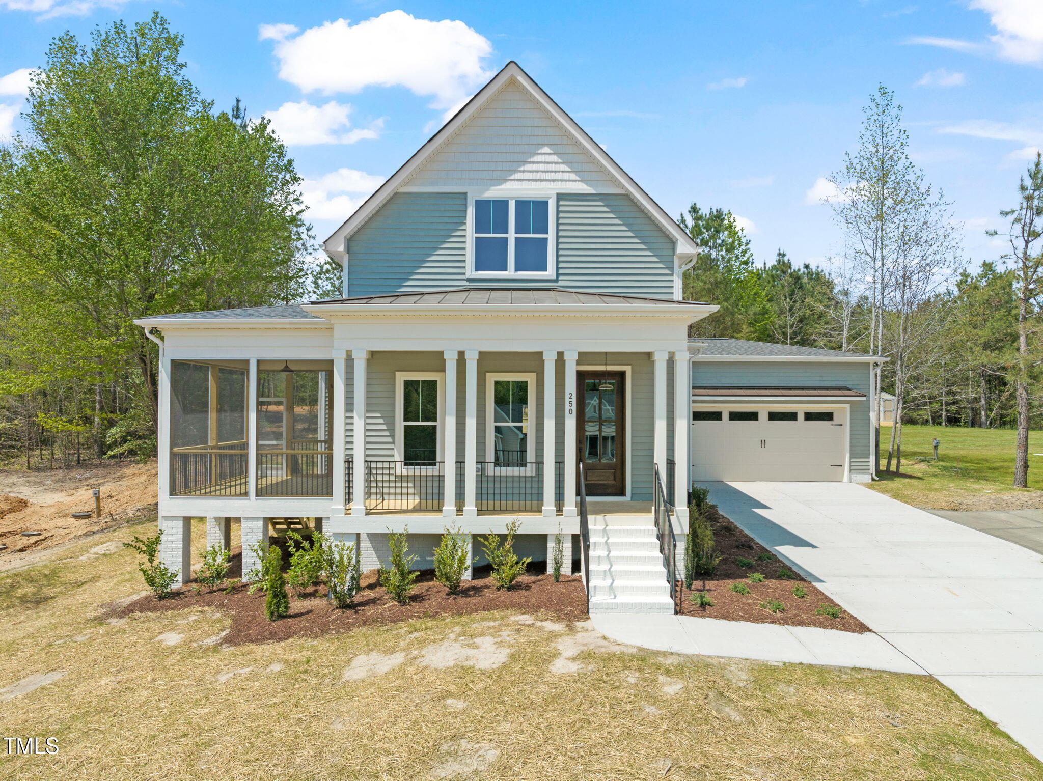 250 Pilot Ridge Road Zebulon, NC 27597 - Photo 1 of 43 front view of a house with a patio