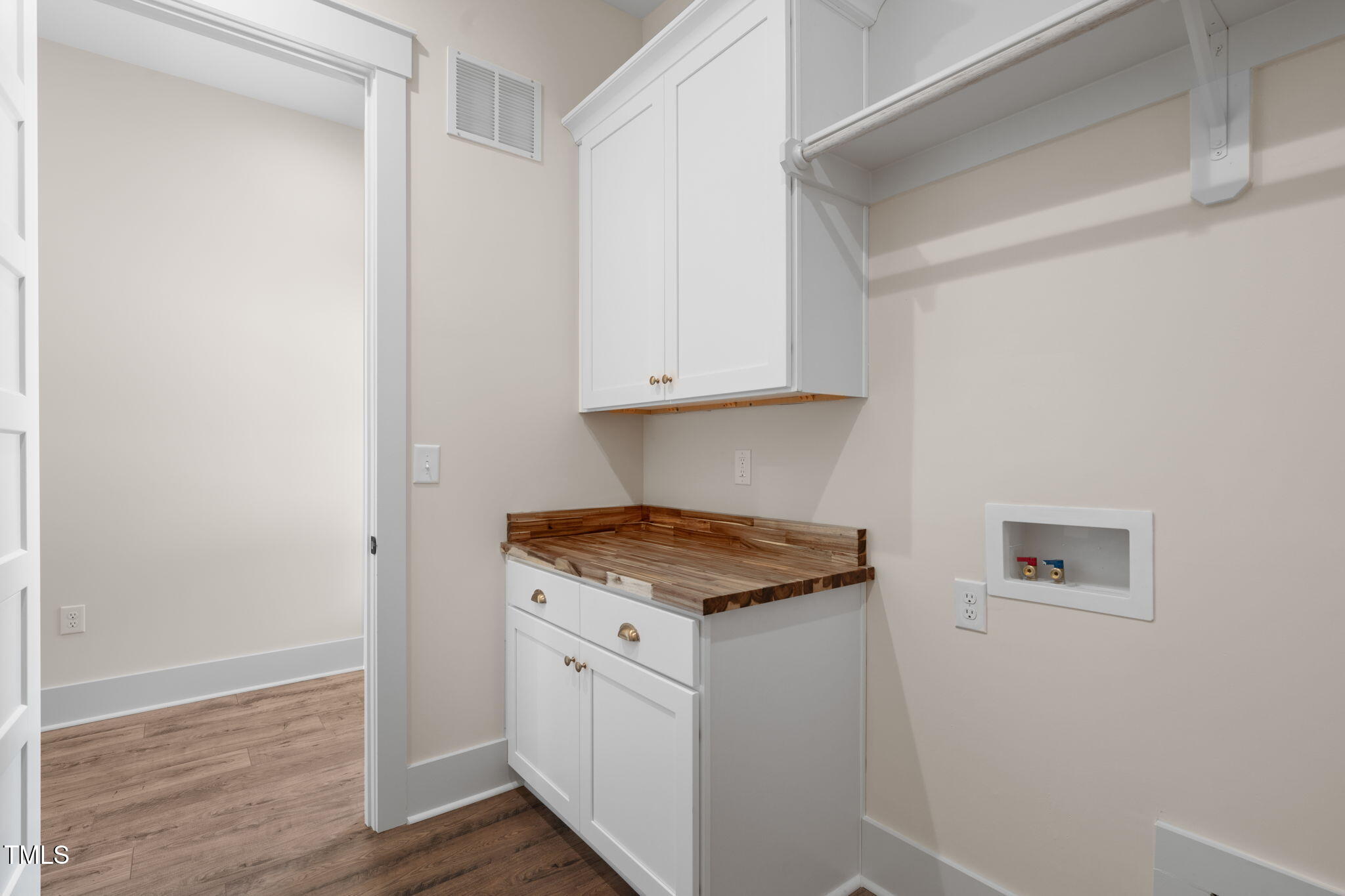 250 Pilot Ridge Road Zebulon, NC 27597 - Photo 15 of 43 a kitchen with granite countertop white cabinets and white appliances
