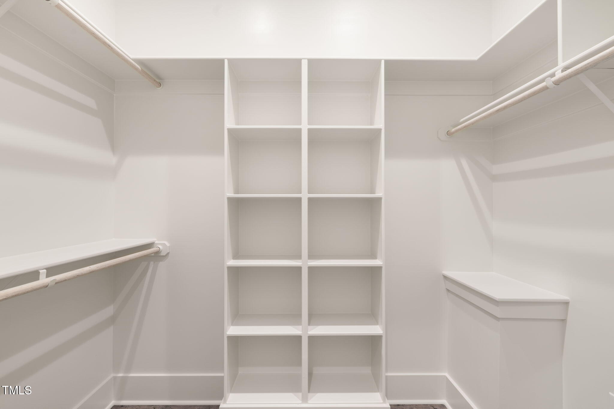 250 Pilot Ridge Road Zebulon, NC 27597 - Photo 22 of 43 a view of walk in closet with empty racks