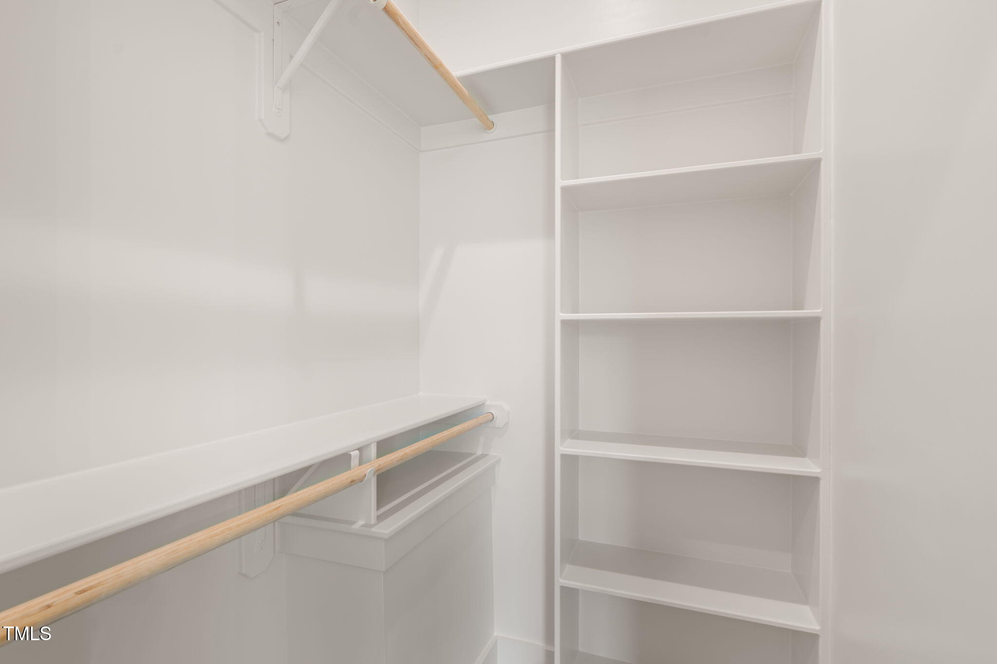 250 Pilot Ridge Road Zebulon, NC 27597 - Photo 23 of 43 a view of an empty walk in closet