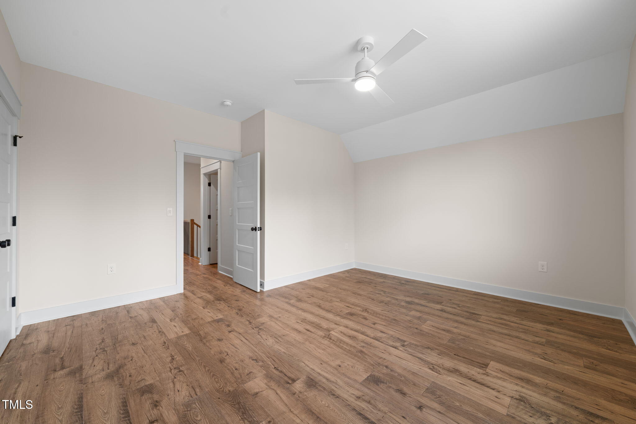 250 Pilot Ridge Road Zebulon, NC 27597 - Photo 26 of 43 a view of an empty room and wooden floor