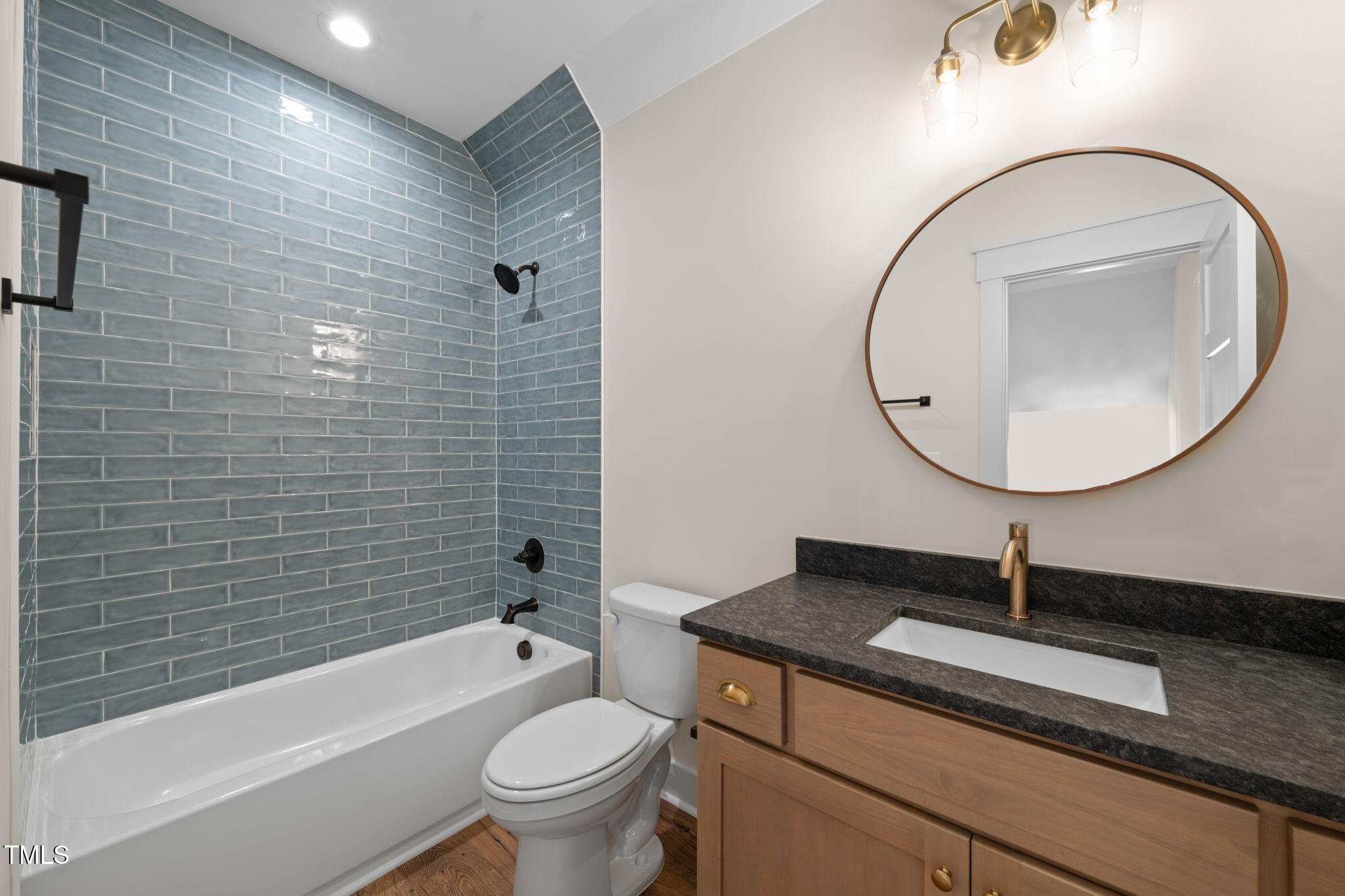250 Pilot Ridge Road Zebulon, NC 27597 - Photo 28 of 43 a bathroom with a sink a toilet and shower