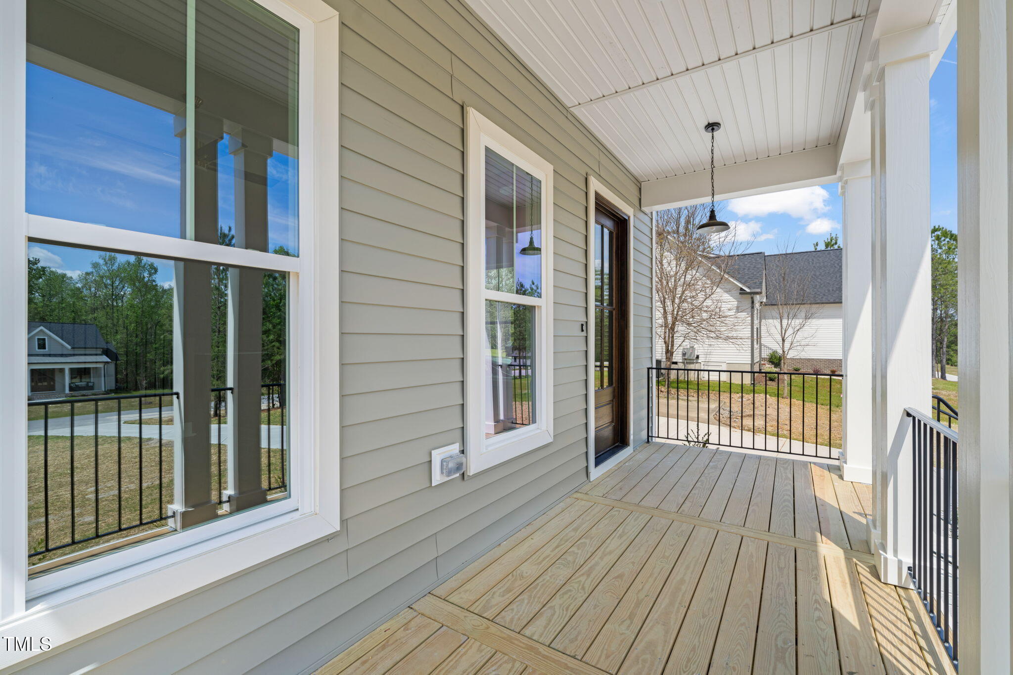 250 Pilot Ridge Road Zebulon, NC 27597 - Photo 3 of 43 a view of a balcony with wooden floor