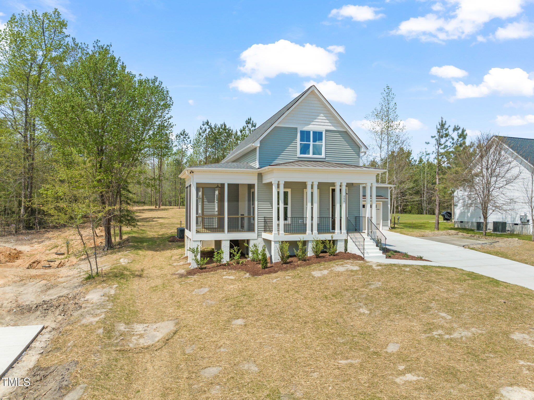 250 Pilot Ridge Road Zebulon, NC 27597 - Photo 33 of 43 a view of a house with a yard and sitting area