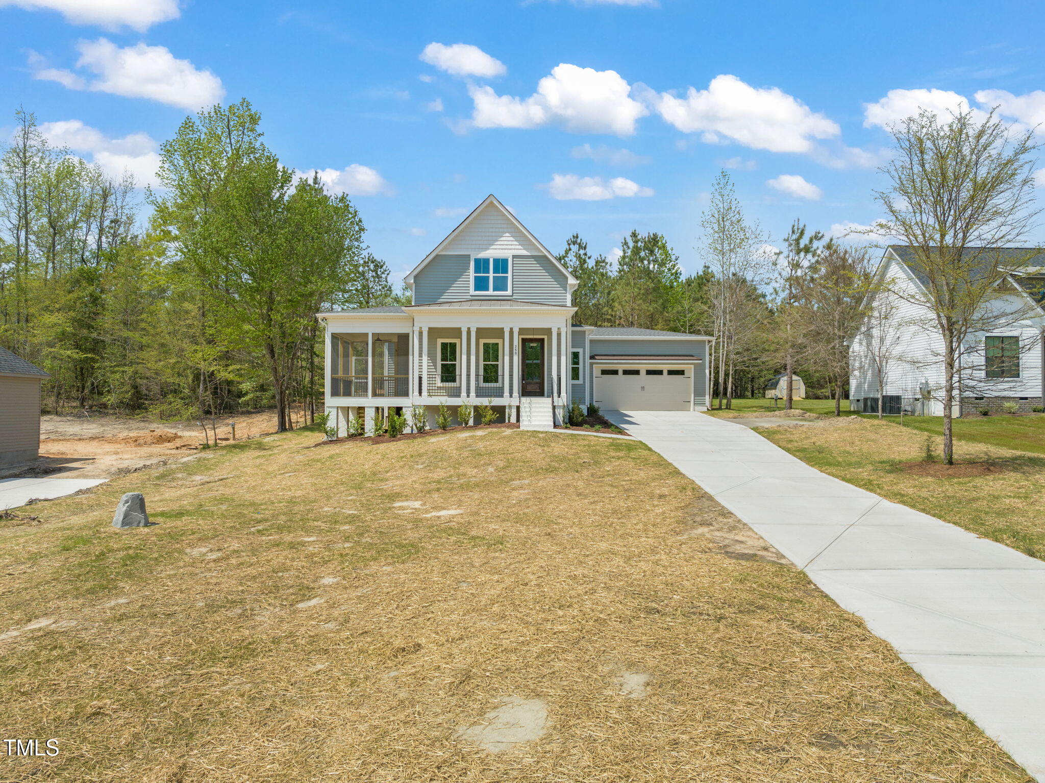 250 Pilot Ridge Road Zebulon, NC 27597 - Photo 38 of 43 a view of house with yard and trees in the background
