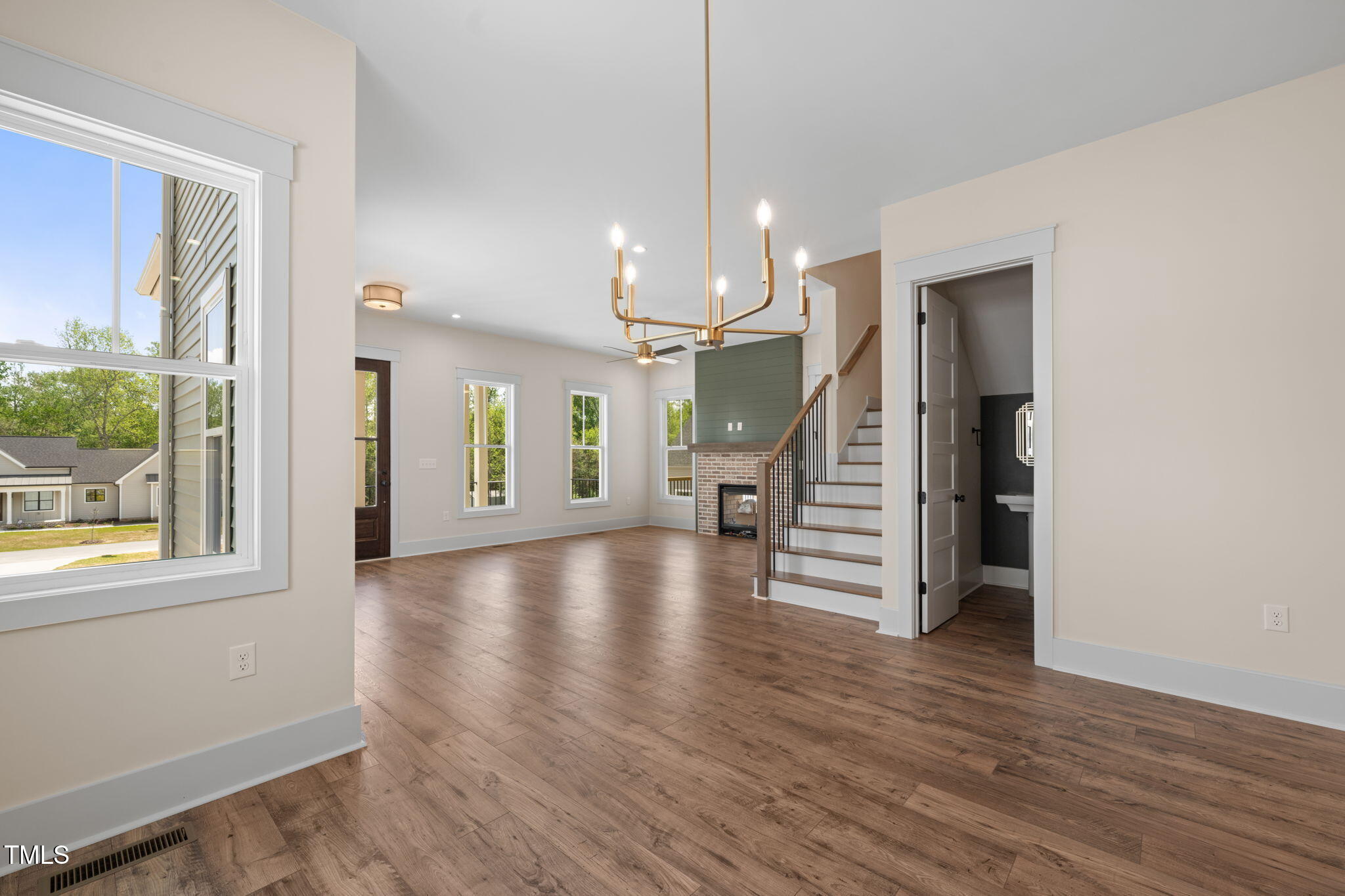 250 Pilot Ridge Road Zebulon, NC 27597 - Photo 9 of 43 a view of a room with wooden floor and a window