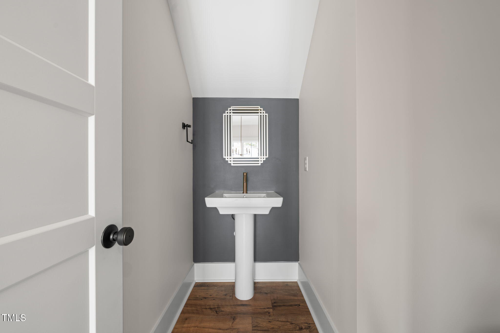 250 Pilot Ridge Road Zebulon, NC 27597 - Photo 10 of 43 a view of a hallway with wooden floor and staircase