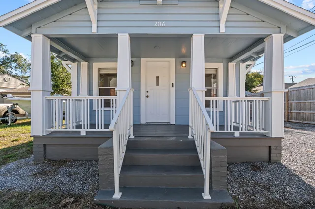 a house view with a garden space