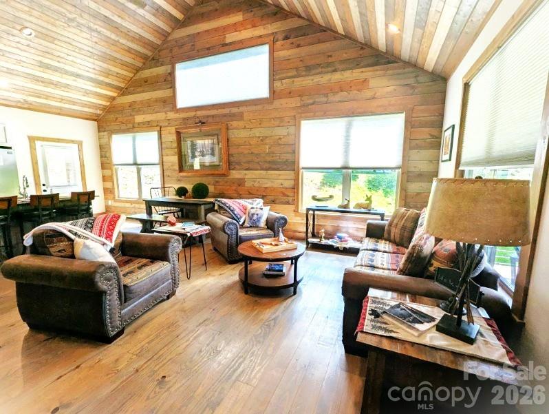 10 Rio Bravo Drive, Unit 4 Sylva, NC 28779 - Photo 19 of 33 a living room with furniture and a large window
