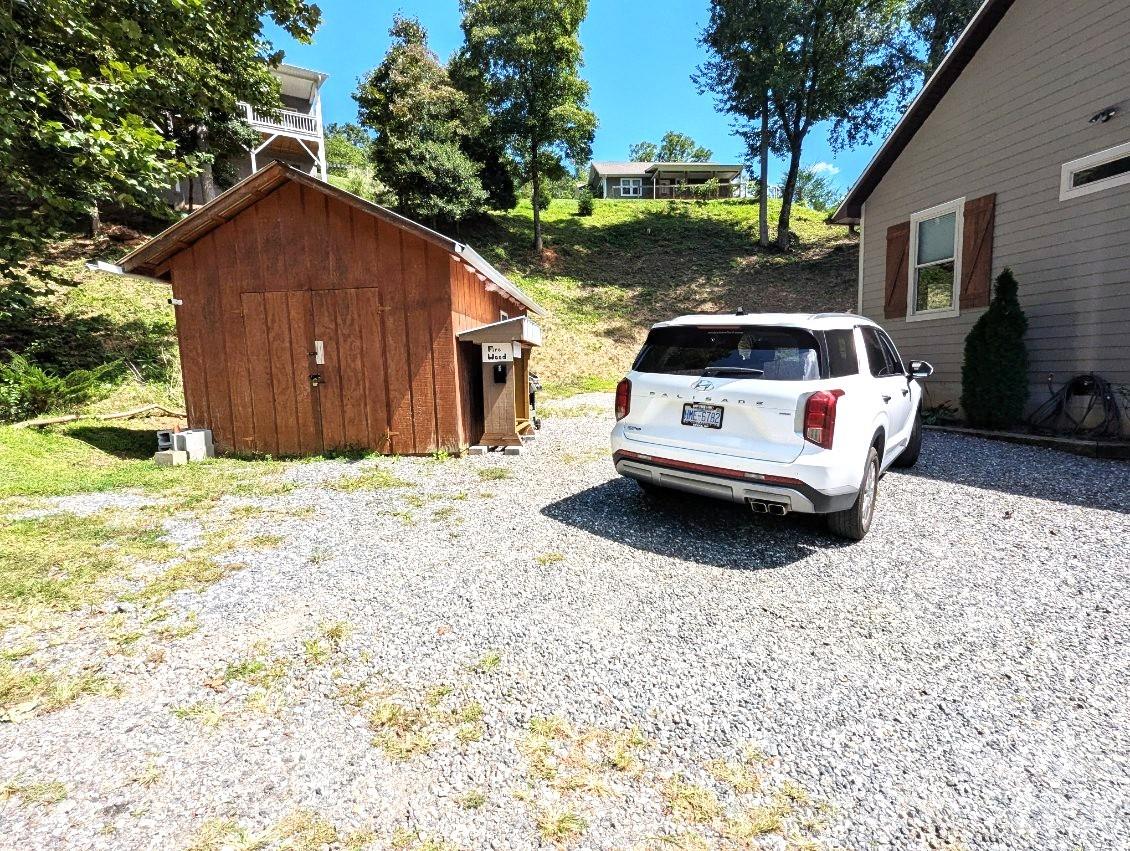 10 Rio Bravo Drive, Unit 4 Sylva, NC 28779 - Photo 3 of 33 a car parked in front of white house